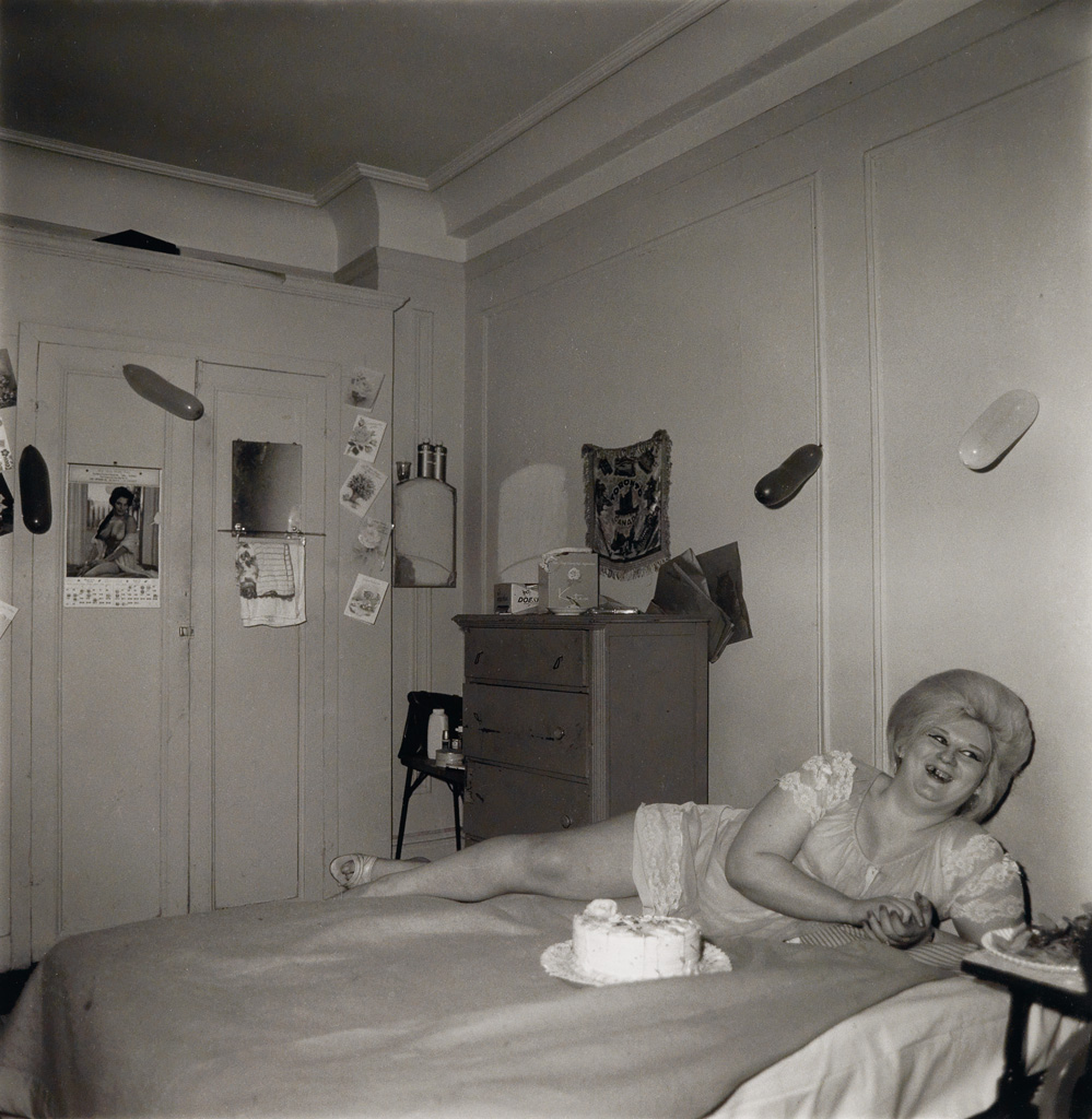 DIANE ARBUS (1923-1971)/NEIL SELKIRK (1947- ) Transvestite at her Birthday Party, New York City.